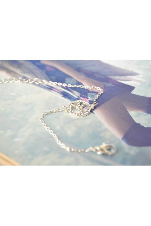 Apyrankė "Peace" aukso ir sidabro spalvų Apyrankė "Peace" aukso ir sidabro spalvų