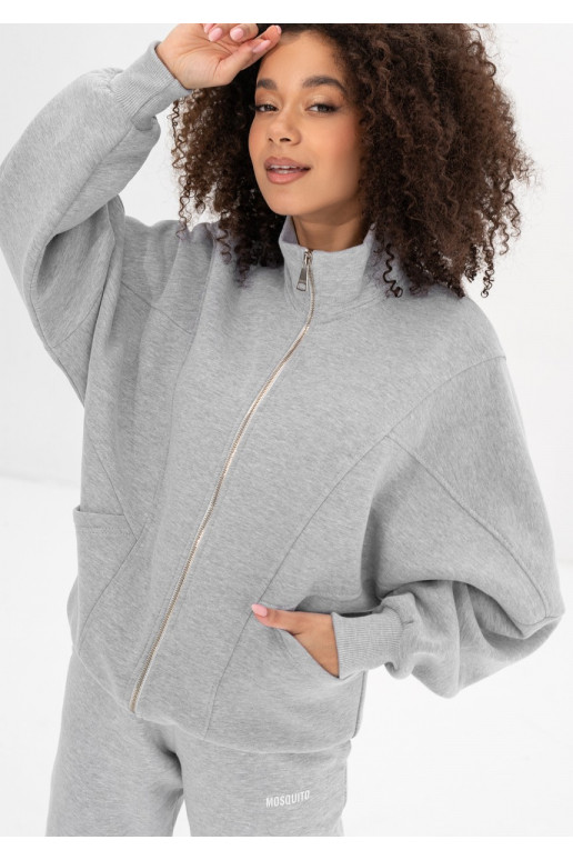 Pagrindas – pilkas melanžinis oversize megztinis su užtrauktuku