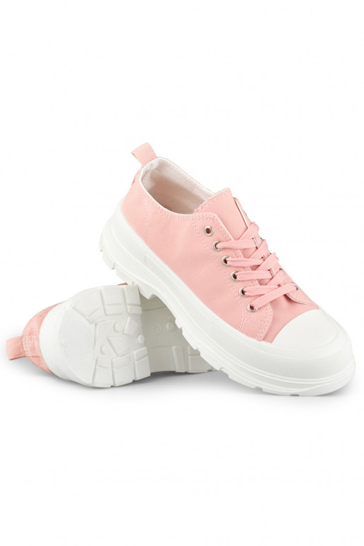 Rožiniai sportbačiai ant žemos...