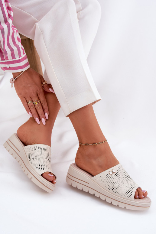 Smėlio spalvos moteriškos odinės...