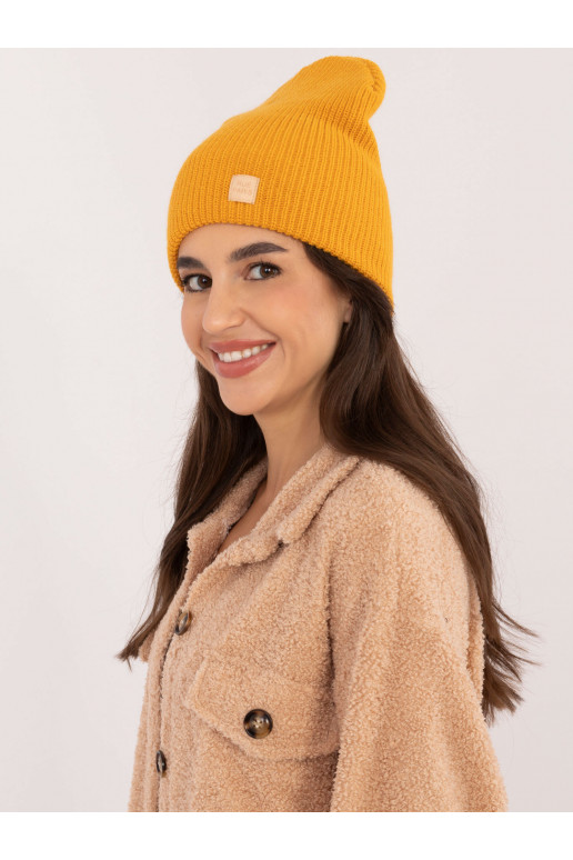 Kepurė tamsiai geltonos spalvos