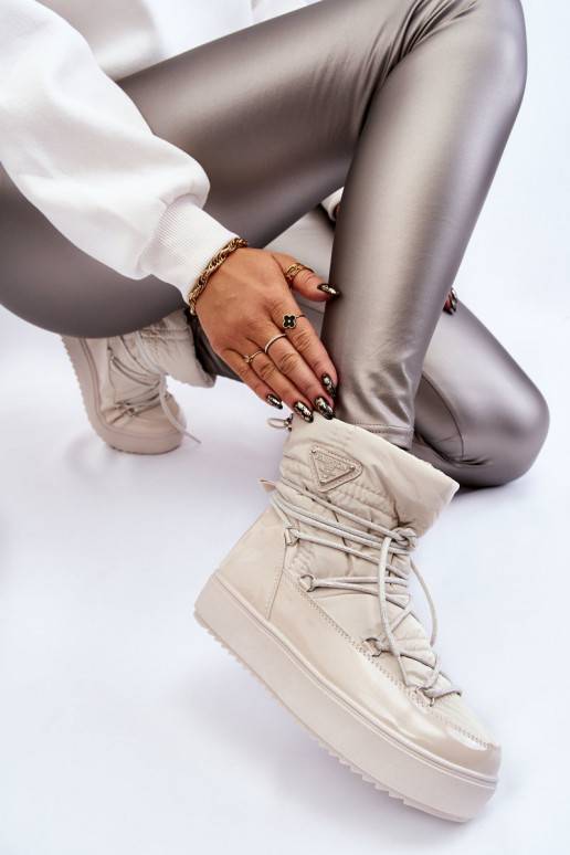    sniego batai su raišteliais dramblio kaulo spalvos Carrios