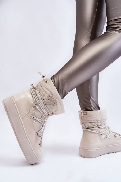    sniego batai su raišteliais dramblio kaulo spalvos Carrios